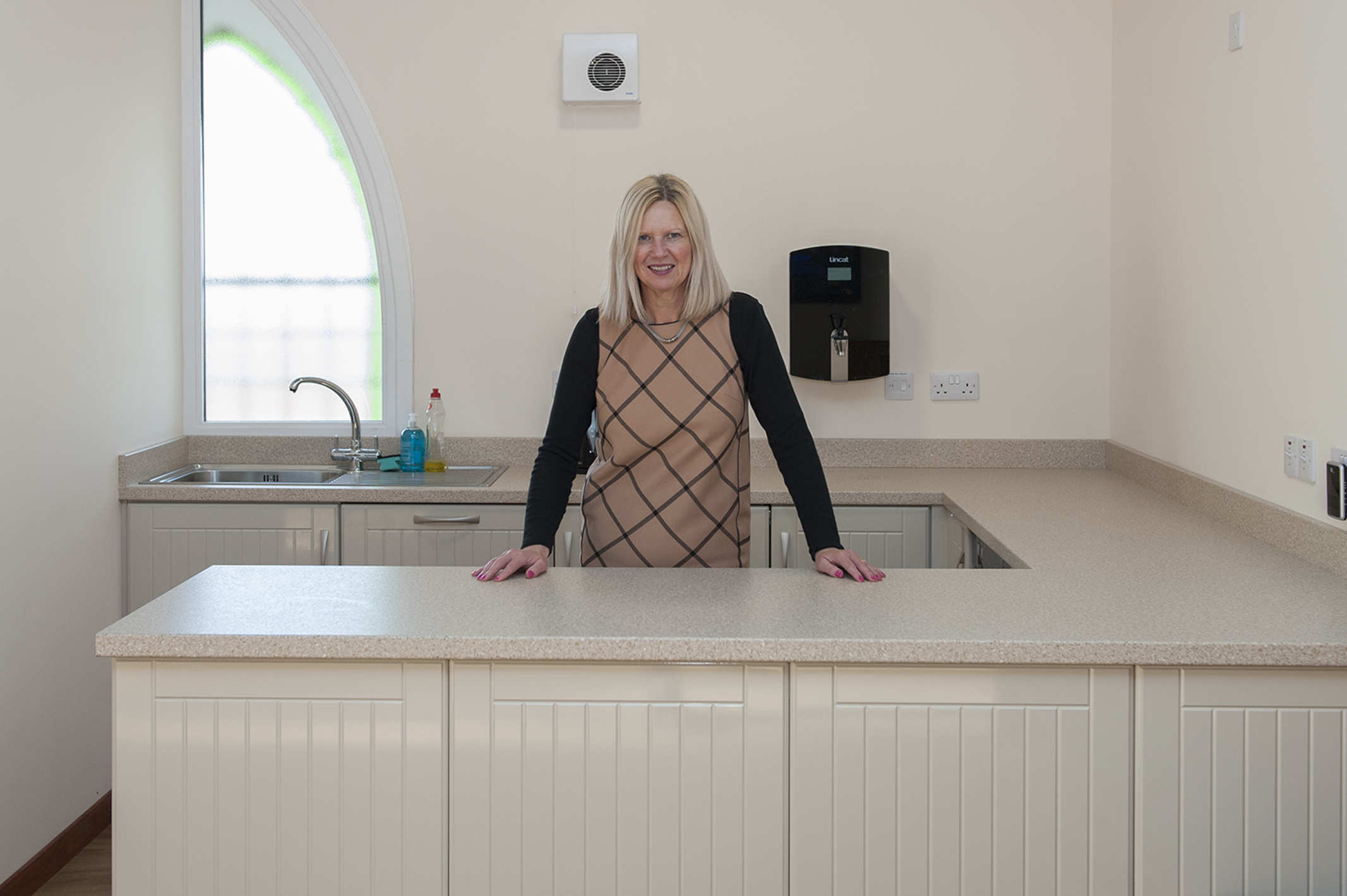 Marion Brownlie Property Convenor, in the new kitchen.