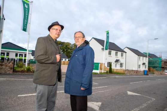 Councillors Jonny Tepp and Tim Brett at the Wormit development.