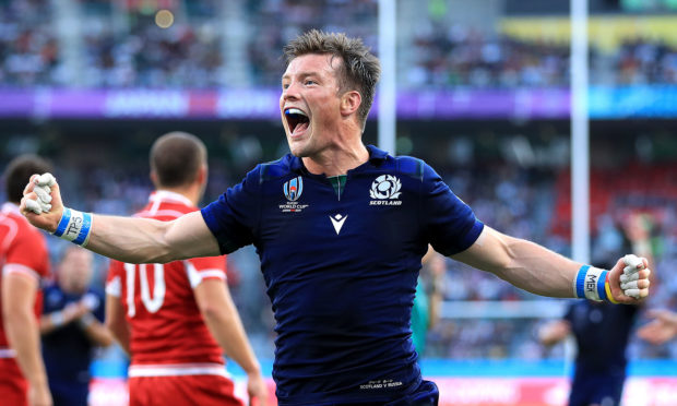 Scotland's George Horne celebrates scoring during the 2019 Rugby World Cup against Russia.