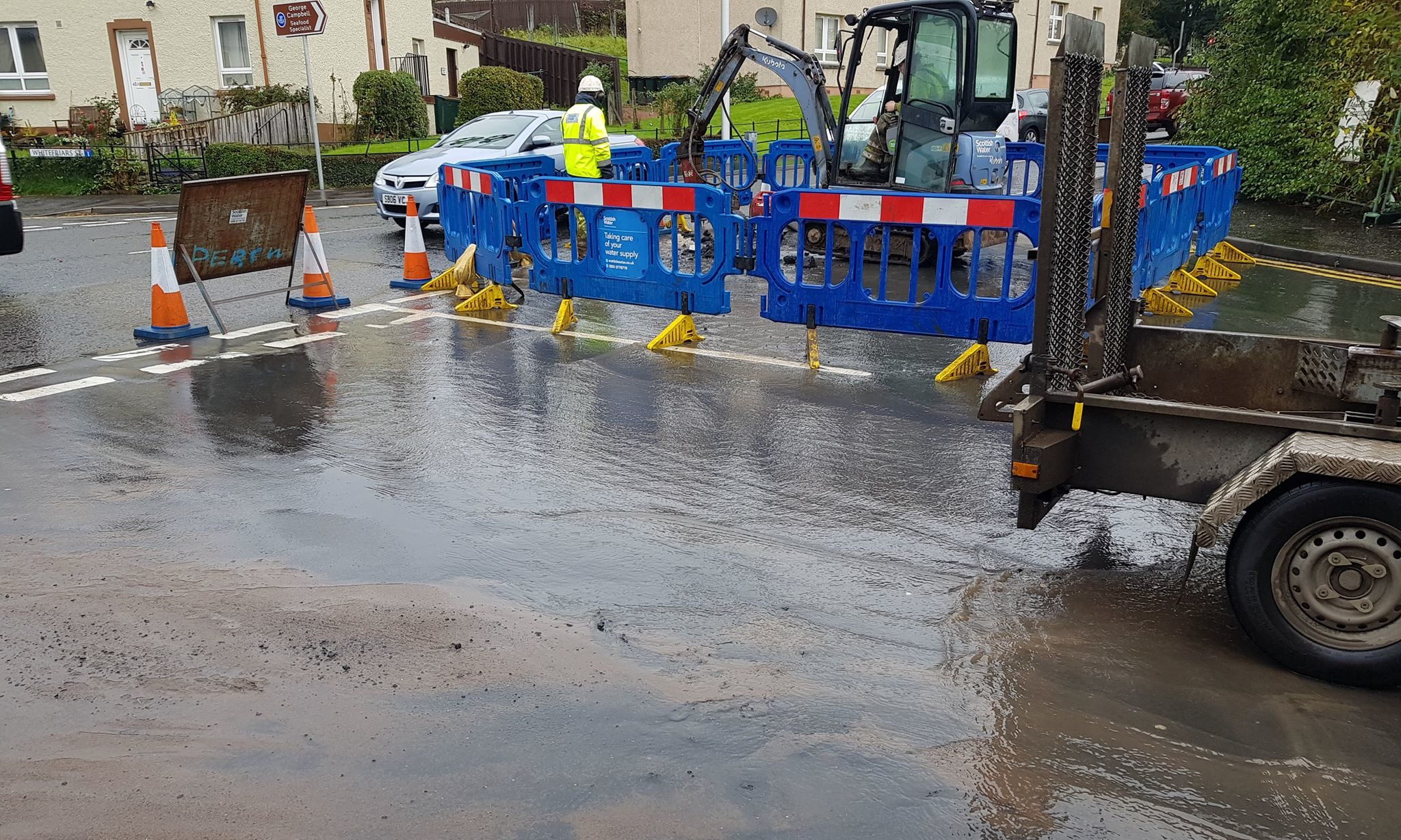 The burst water main on Riggs Road.