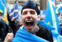 Scottish independence supporters march through Edinburgh.