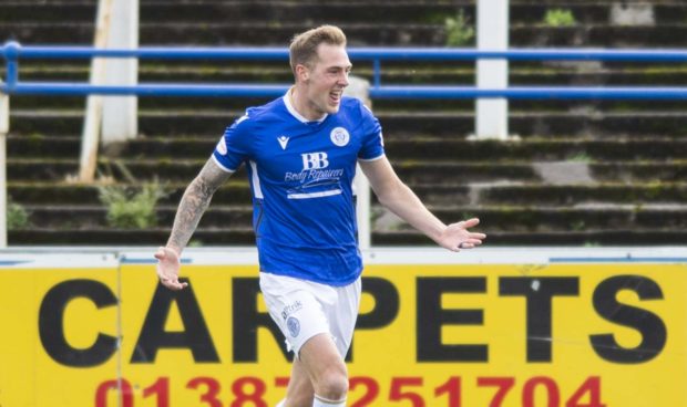 Kevin Holt celebrates making it 2-0 to Queens.