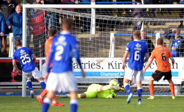 Michael Paton (25) makes it 4-0 to Queen of the South.