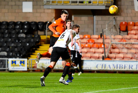 Lawrence Shankland makes it 1-0 to United.