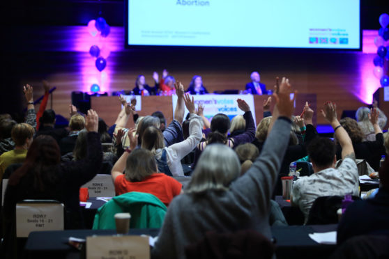 Delegates vote on motions at the STUC Conference. Picture: Phil Hannah.