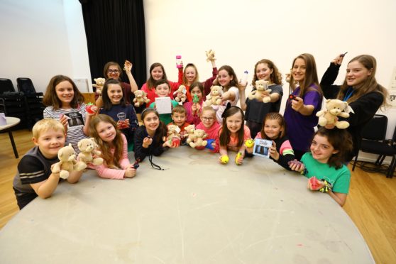 Members of the Horsecross Join In group showcasing items for the sensory packs. Picture credit 
Dougie Nicolson.