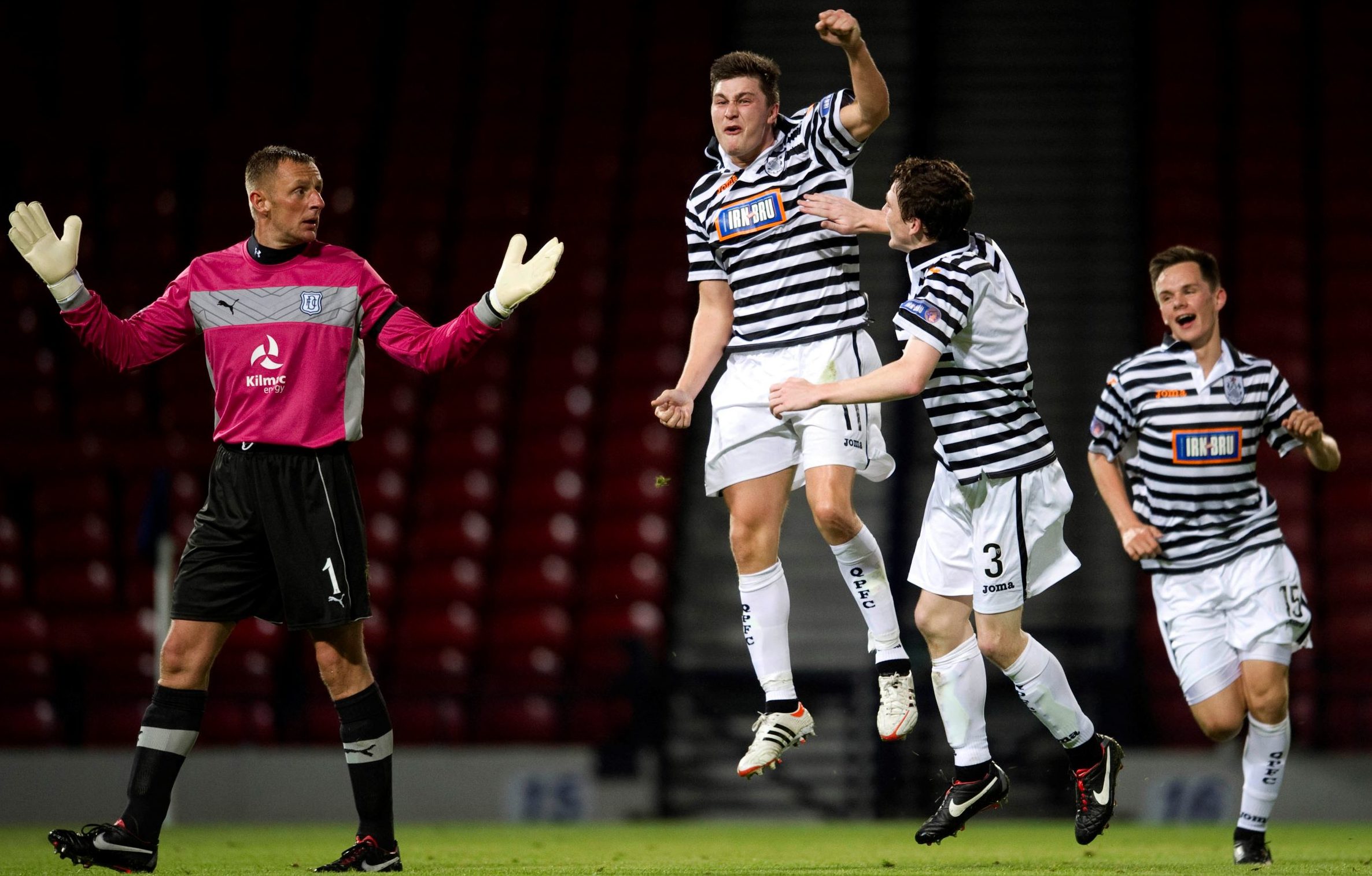 Sean Burns is congratulated by Andy Robertson and Lawrence Shankland after scoring for Queen's Park against Dundee.