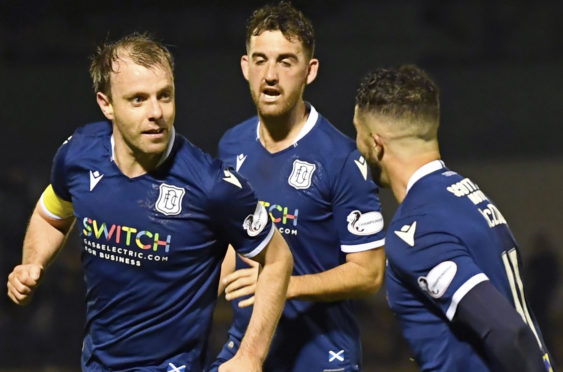 Paul McGowan celebrates his goal at Ayr.