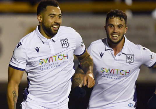 Kane Hemmings celebrates his second goal.