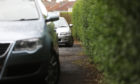 Cars parked on pavements on Ancrum Drive, Dundee. Image: Mhairi Edwards/DC Thomson.
