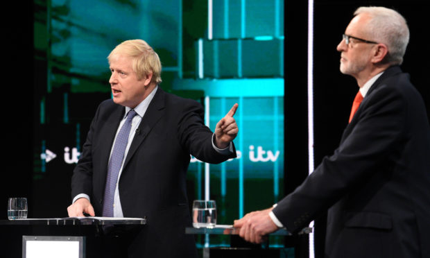 Boris Johnson and Jeremy Corbyn answer questions during the ITV Leaders Debate.