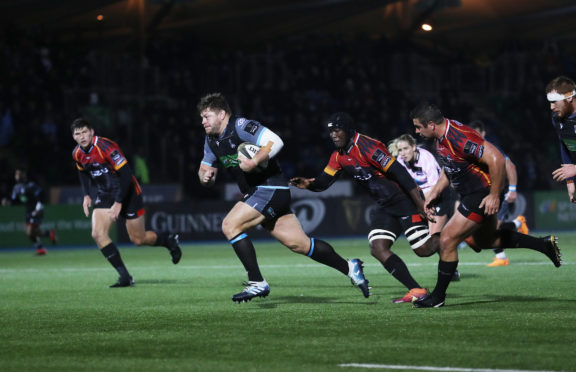 Oli Kebble rumbles in for Glasgow's fourth try in their big win over the Southern Kings.