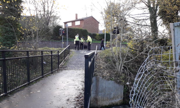 Police are searching the area after a body was found close to Woodmill Road in Dunfermline.