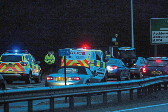 At least eight cars hit debris on the A9 between Gleneagles and Auchterarder.