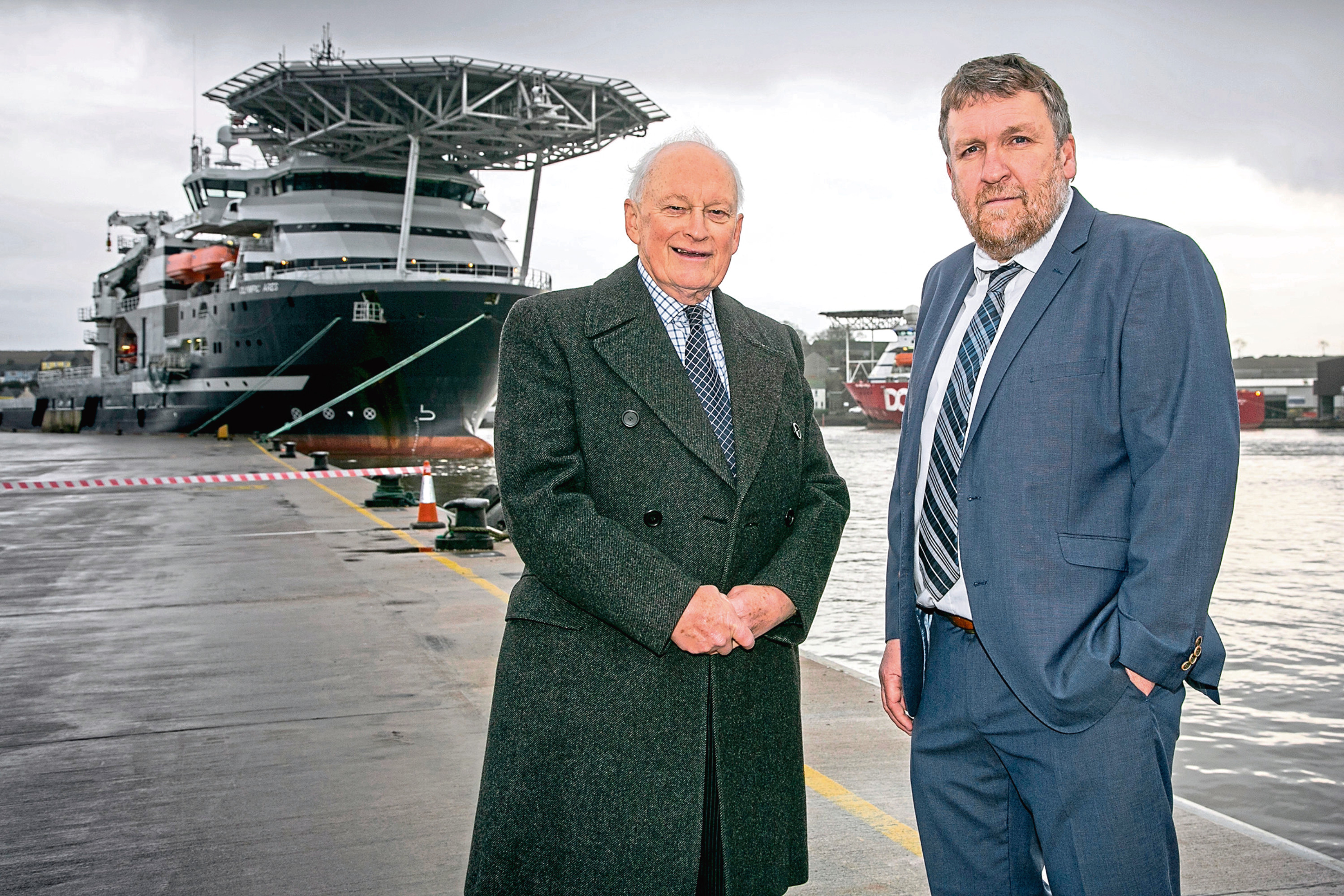 Montrose Port Authoritys outgoing chairman John Carmichael and chief executive Captain Tom Hutchison.