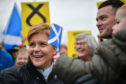 Nicola Sturgeon and Dave Doogan, SNP candidate for Angus, meets with activists and supporters on the general election campaign trail on  in Arbroath, Scotland.