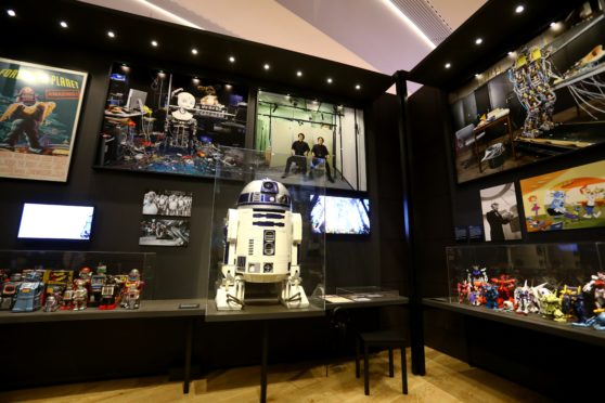 The robots on display in the Hello, Robot exhibition at the V&A Dundee.