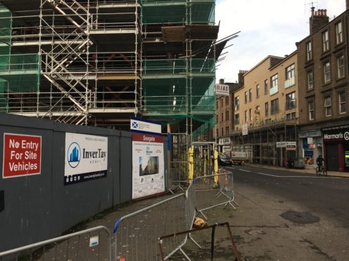 The road at Trades Lane blocked off to allow construction work.