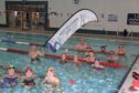 Montrose Triathlon Club celebrate success at this week's swim training session.