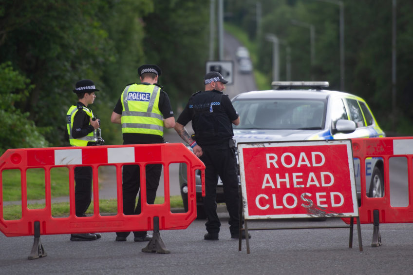 Police guard road block following Glenrothes tragedy.