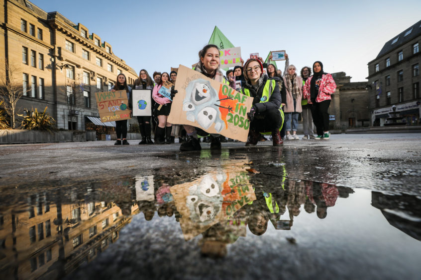 Local pupils Hannah Mackay and Elsie MacDonald taking part in the climate strike in Dundee. Photos by Kris Miller.