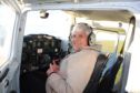 Mabel in the plane she flew for her 80th birthday.