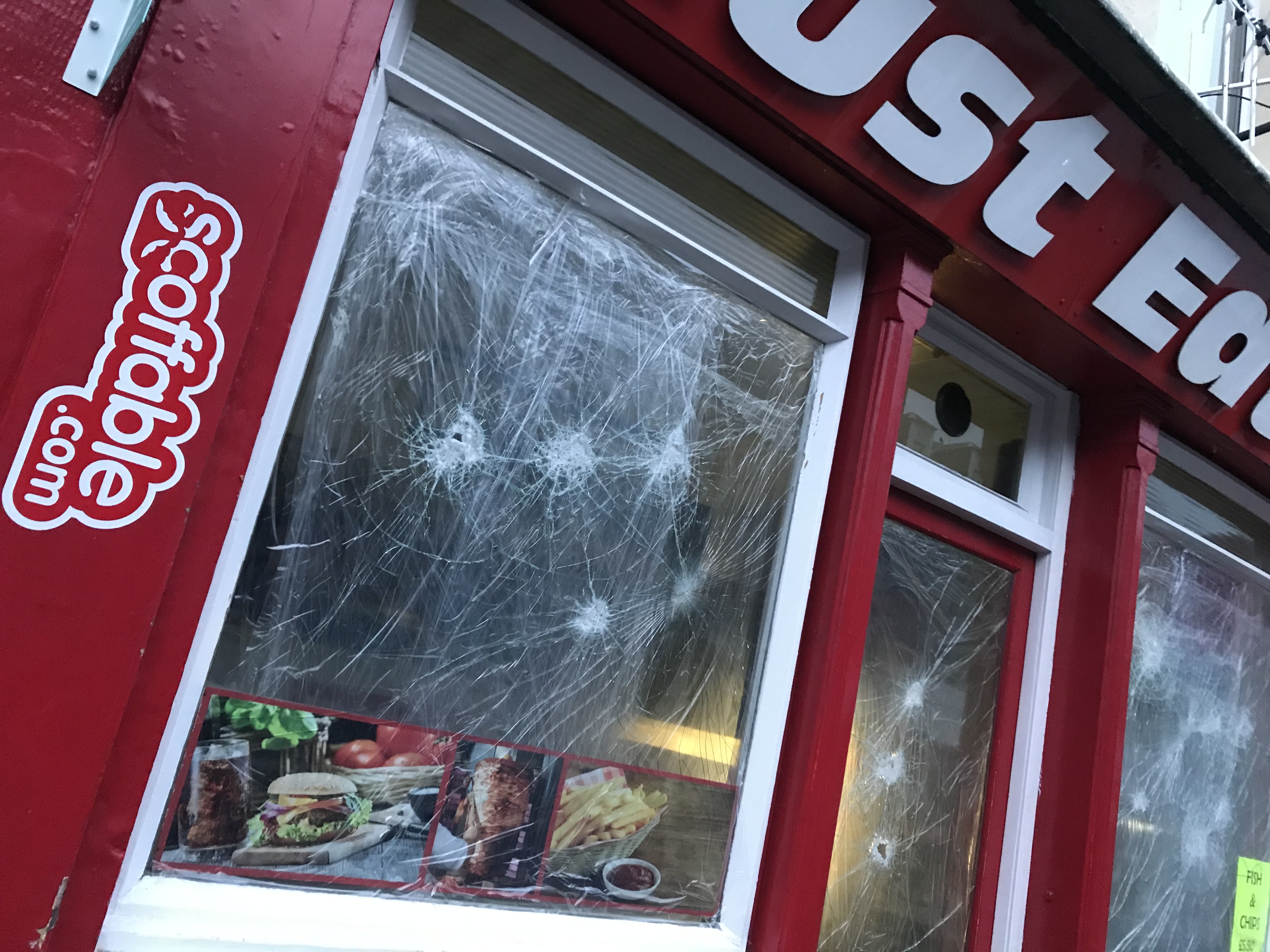 The Must Eat premises in the aftermath of the attack.