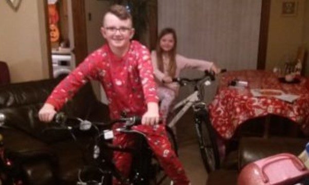 Rhys with his bike, just after unwrapping it last Christmas.