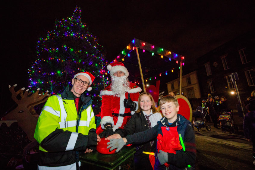Councillor Fraser MacPherson and Santa at a previous West End Christmas