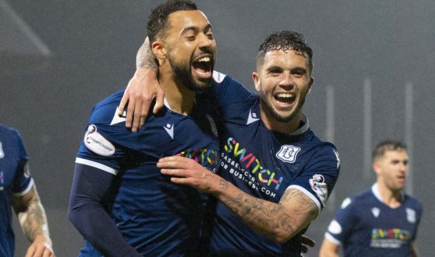 Kane Hemmings, left, after opening the scoring for Dundee.