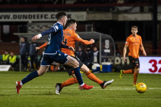 Lawrence Shankland makes it 2-0 to United.