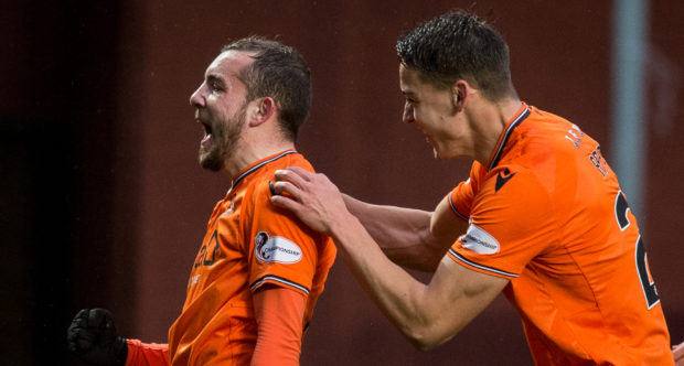 Paul McMullan, left, celebrates his goal with the help of Louis Appere.