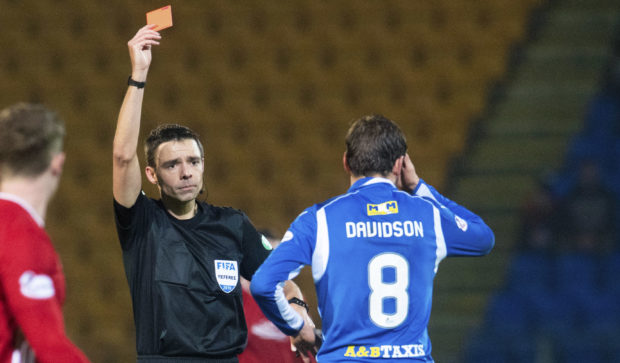 Ref Kevin Clancy shows Murray Davidson the red card.