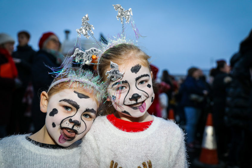 Lucie & Ellie from Tolmie Dance School pose with their doggy makeup on at the Monifieth Christmas lights switch-on.