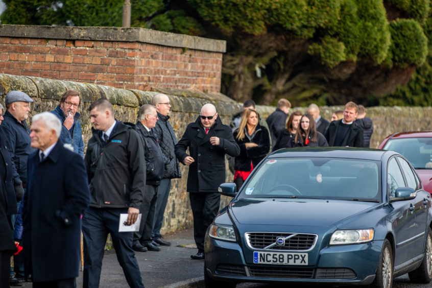 Family, friends, colleagues and well wishers gather for Councillor Wullie Clark's funeral.