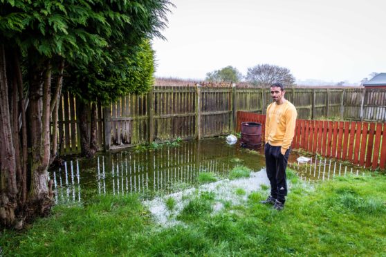 Mark Taylor is angry his garden in Seton Terrace has flooded again.