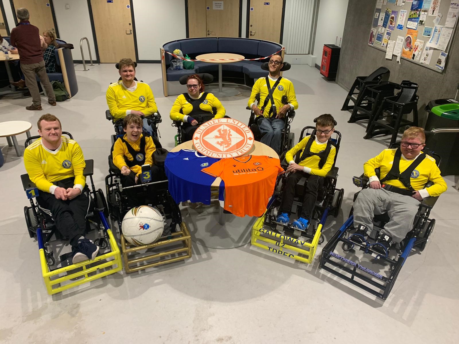 Tayside Dynamos members front row (from left): Nicky Duncan, Alexander Johnstone, Eythan Galloway, Logan Mitchelson. Back row: Kein Speed, Kristin MacMaster, Liam Ritchie.
