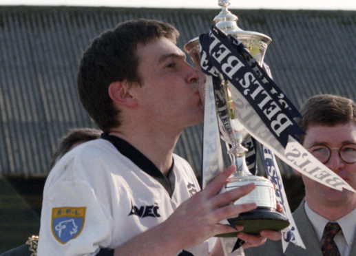 Barry Smith with the First Division trophy in 1998.