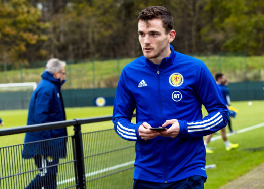Andy Robertson on the sidelines during Scotland's training session.