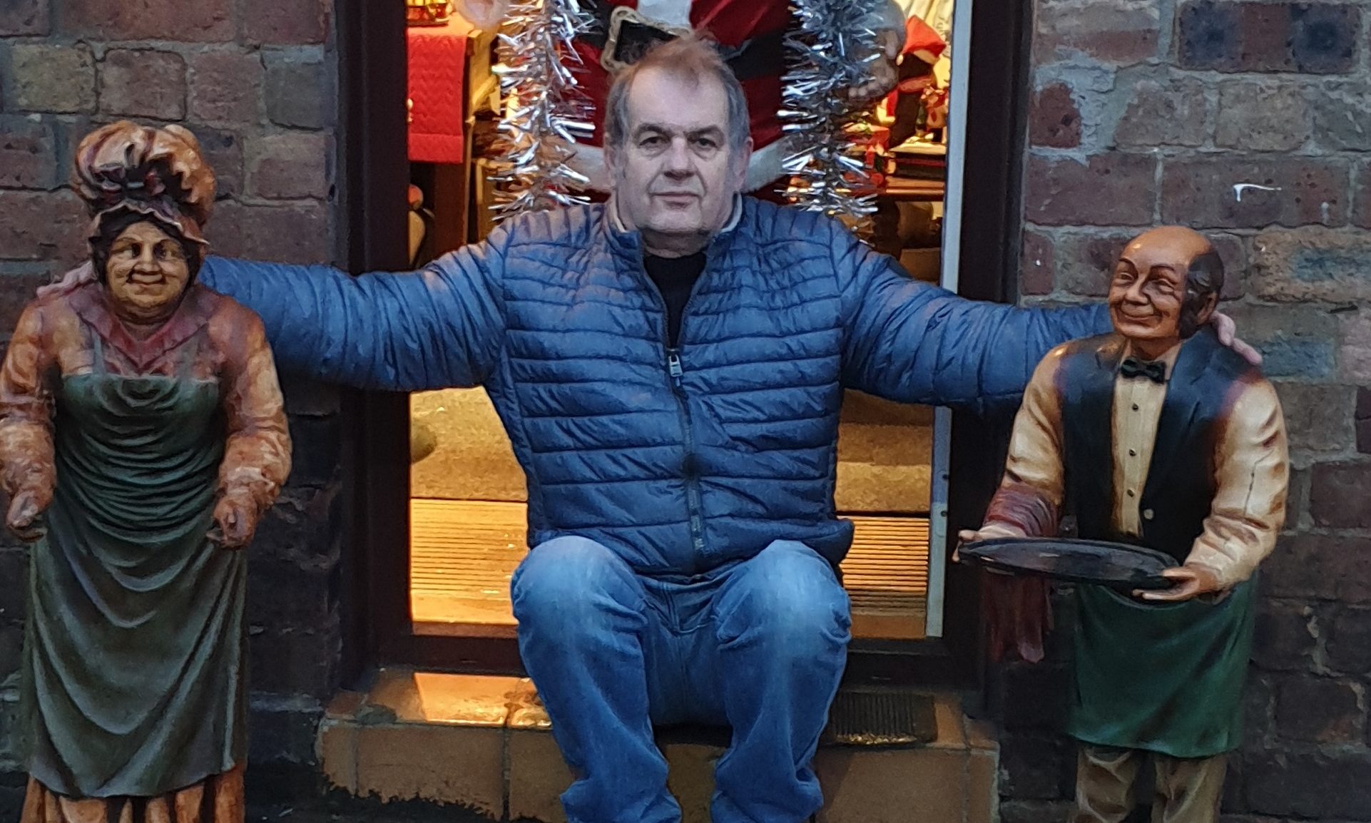 Derek Pook, owner of Clepington Antiques and Collectables Centre, with the statues.