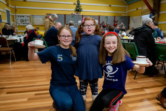 Helen, left, and Ruby, right, with Caitlin Wilkie.