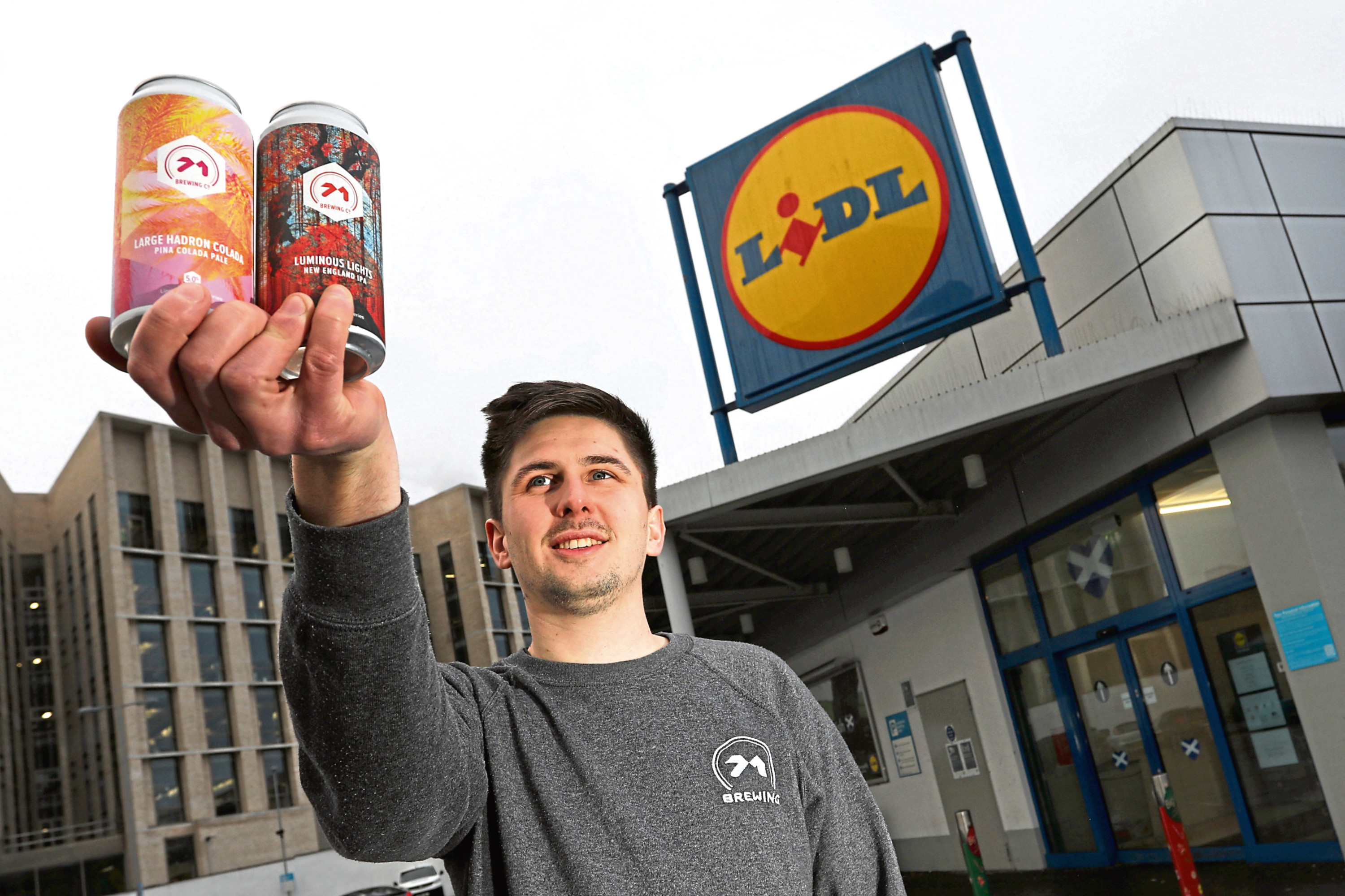 71 Brewings Kieran McGuire with the new cans outside Lidl in Dundee. Picture: Stewart Attwood.