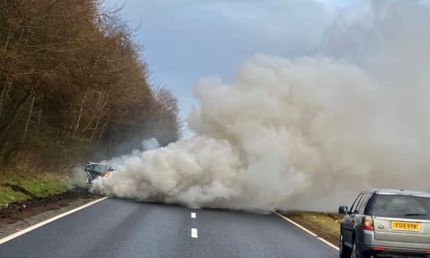 Fumes belched from the car on the A92 near Glenrothes.