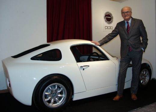 Event director Douglas Anderson at the recent launch of his ADO Coupe, the first new car made in Scotland for nearly 40 years.