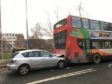 A silver Mazda collided with a 73 bus in Dundee's King Street.