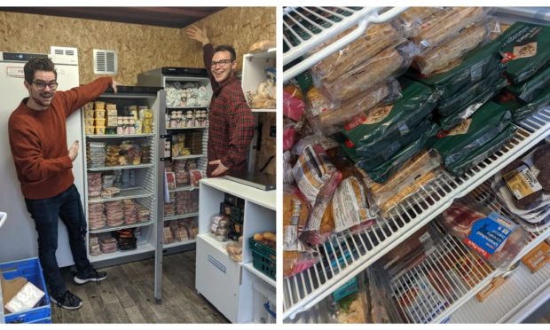 Volunteers Will Holliday and Kaleb Brown with the food donations.