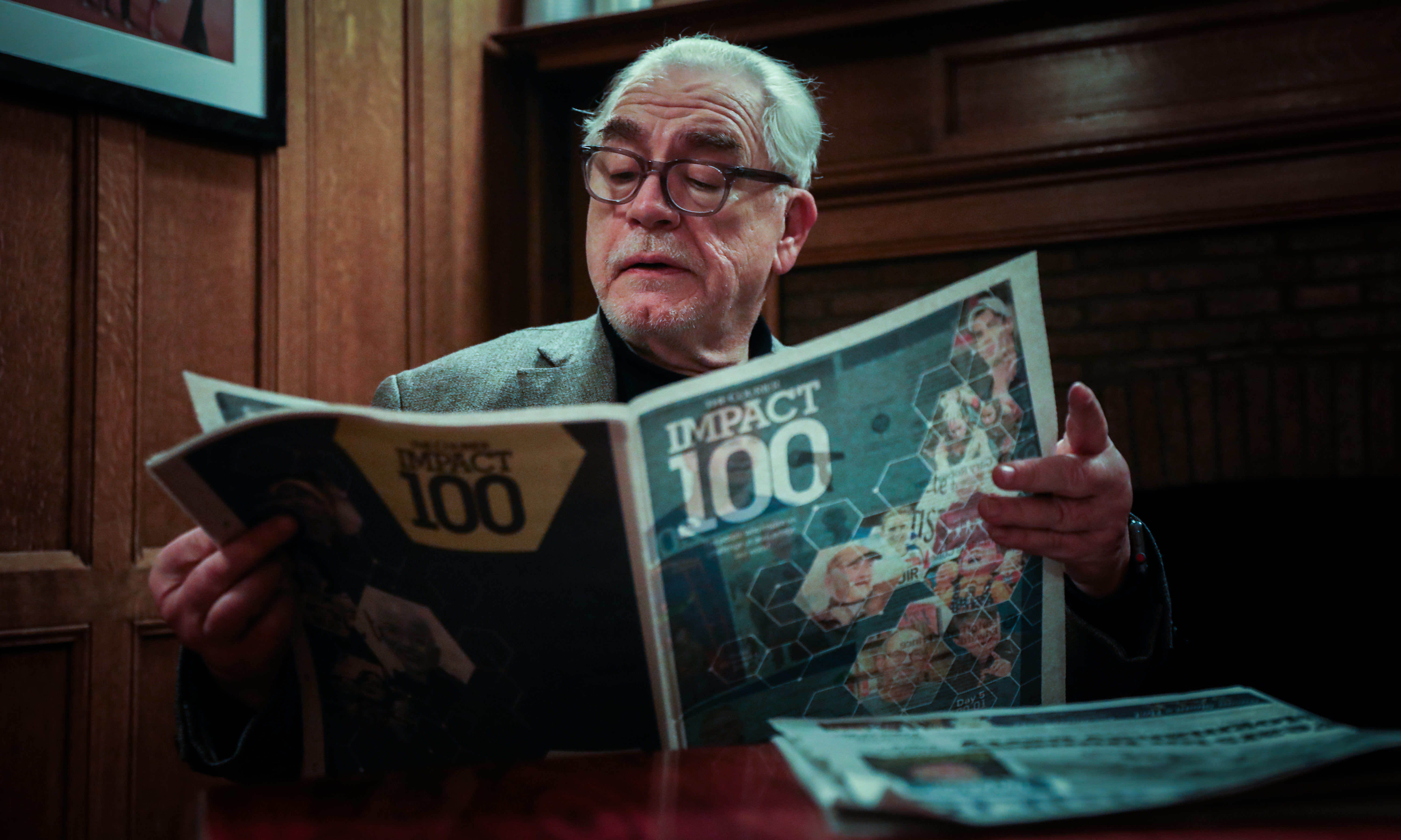 Brian Cox with a copy of The Courier Impact 100