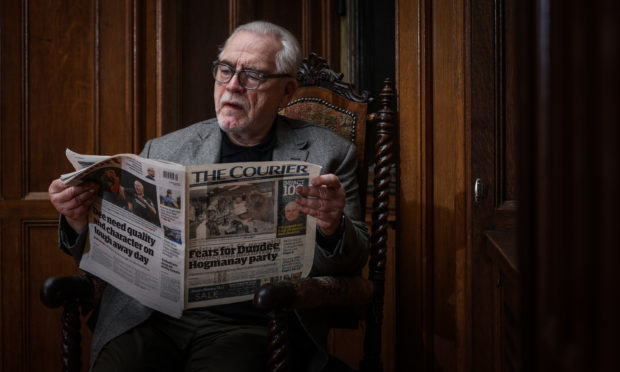 Brian Cox with a copy of The Courier