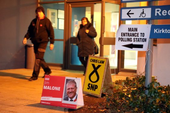 Voters leaving Downfield Primary School on Thursday morning.