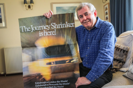 Ian Lamb with a promotional poster.